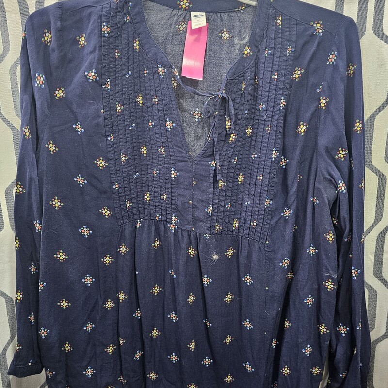 Long sleeve navy blue light weight blouse with multi colored little prints.