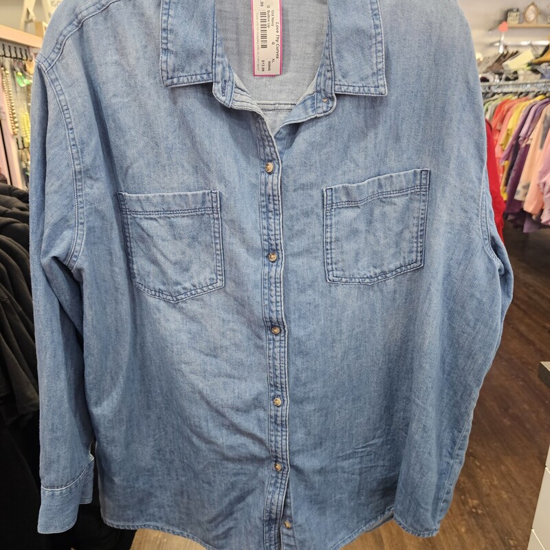 Long sleeve button up top in denim.