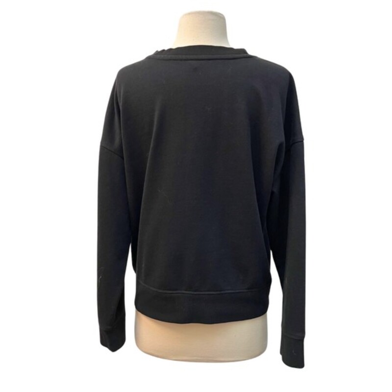 Calvin Klein Sweatshirt and Leggings Set<br />
Black, and White<br />
Size: Medium