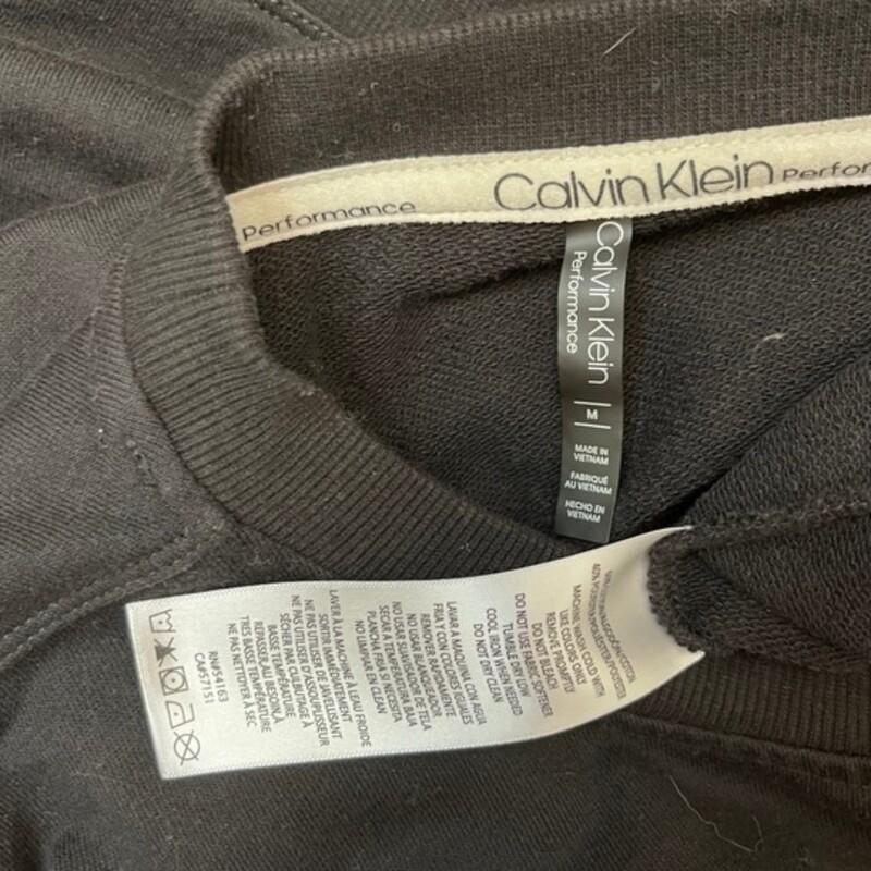 Calvin Klein Sweatshirt and Leggings Set<br />
Black, and White<br />
Size: Medium