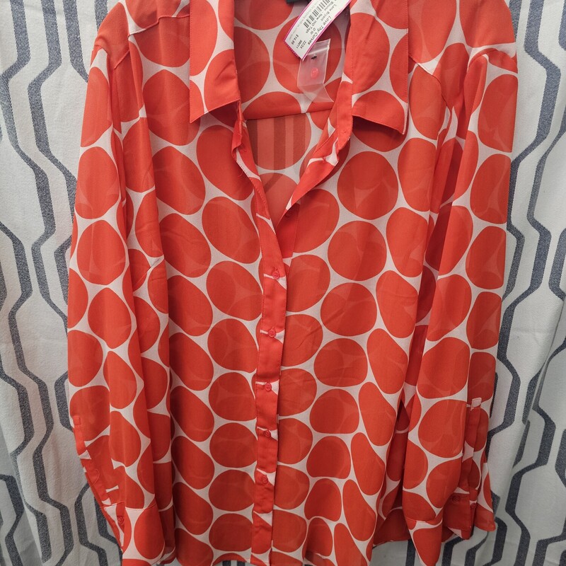 Beautiful sheer blouse with button up front in white with bold orange circle pattern. New without tags