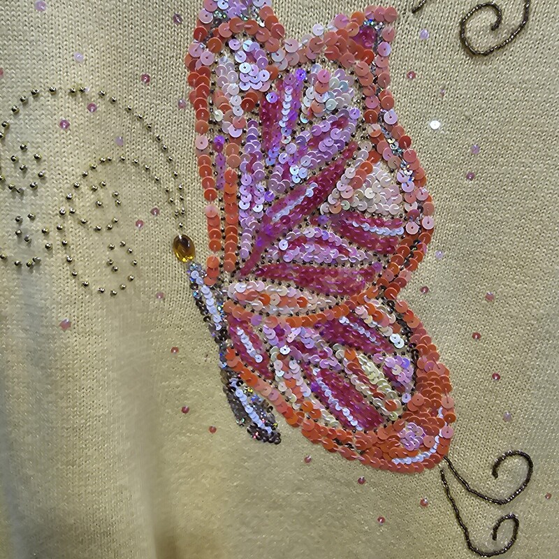 Long sleeve sweater in yellow with sequined butterfly