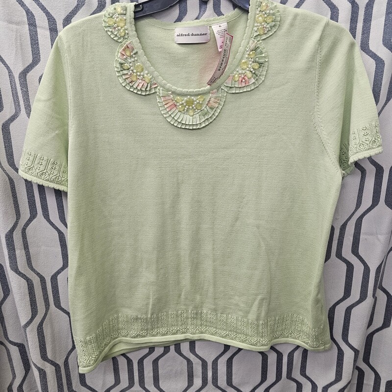 Super cute short sleeve sweater with beading on the collar in mint green.