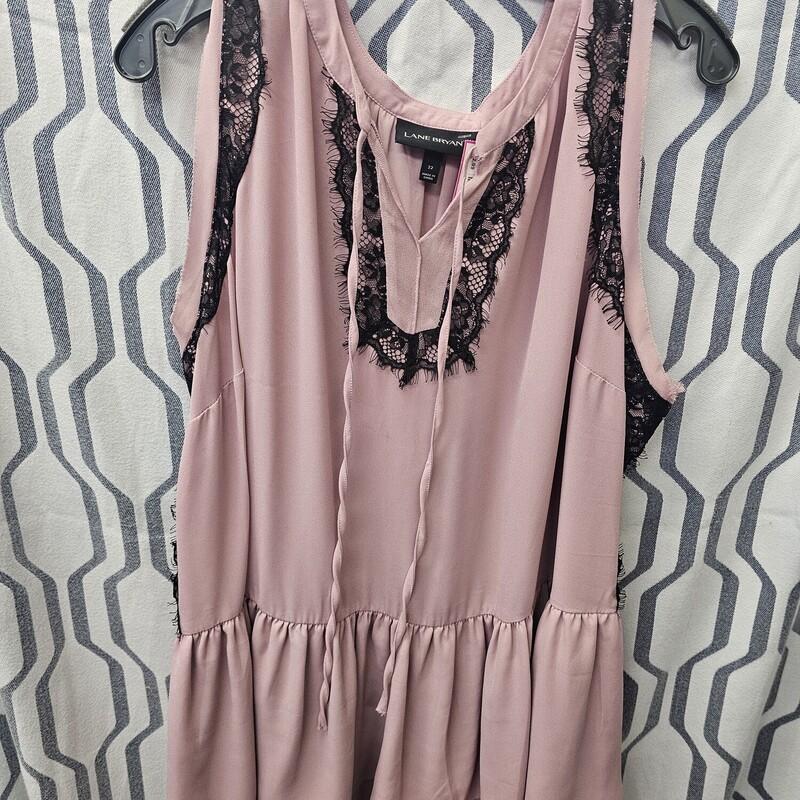 Beautiful tank styled sleeveless blouse in mauve with black lace.