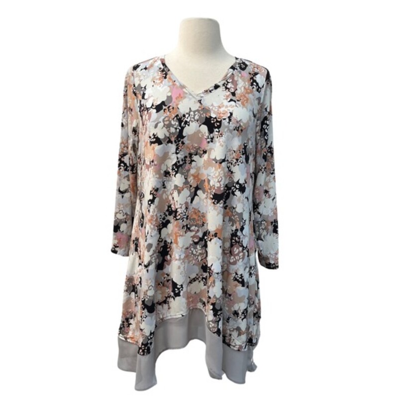 Logo Lounge Tunic<br />
Sheer Ruffle Detail<br />
Abstract Floral Design<br />
Color: Cream and Black<br />
Size:  Medium