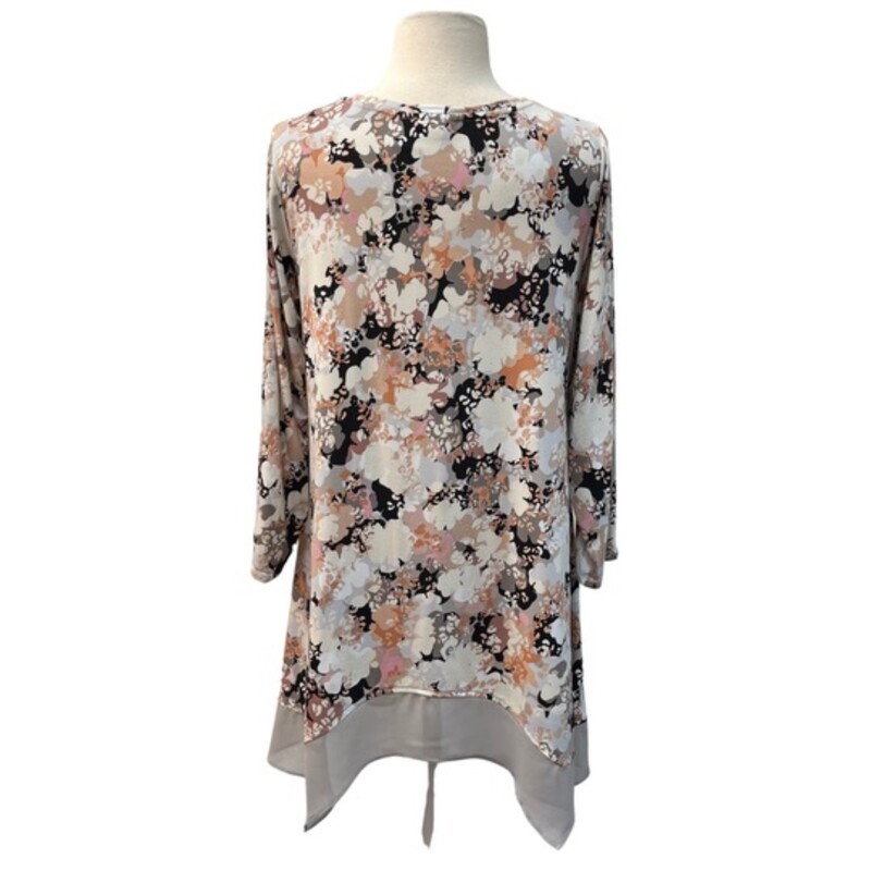 Logo Lounge Tunic
Sheer Ruffle Detail
Abstract Floral Design
Color: Cream and Black
Size:  Medium