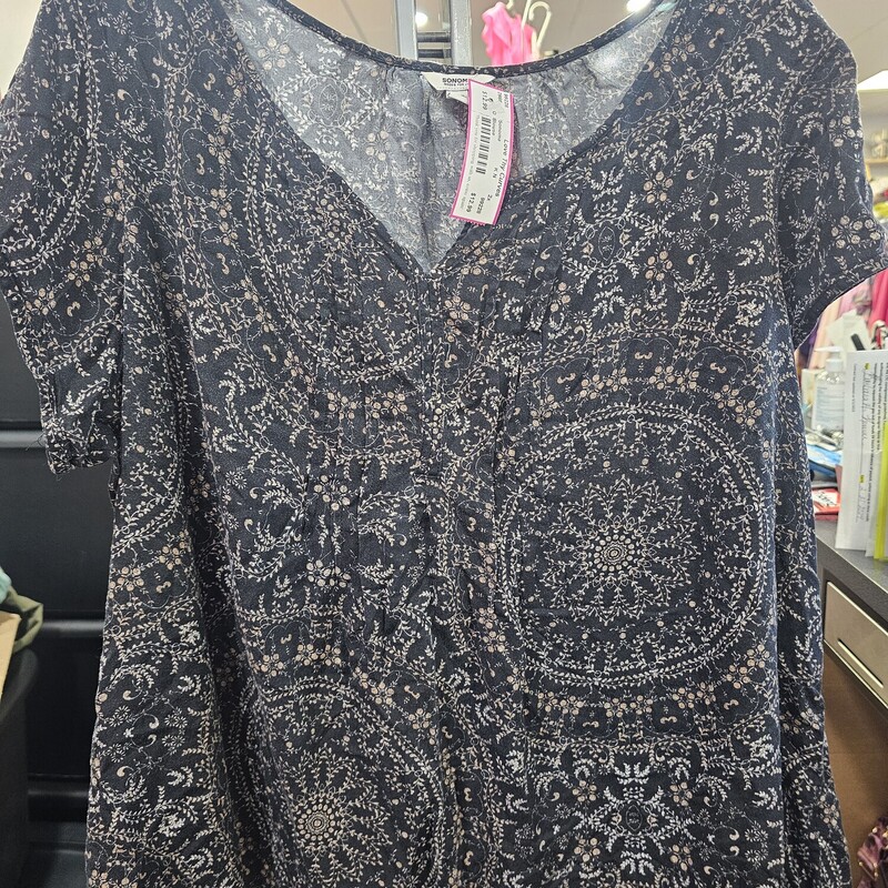 Short sleeve blouse in black with brown print.