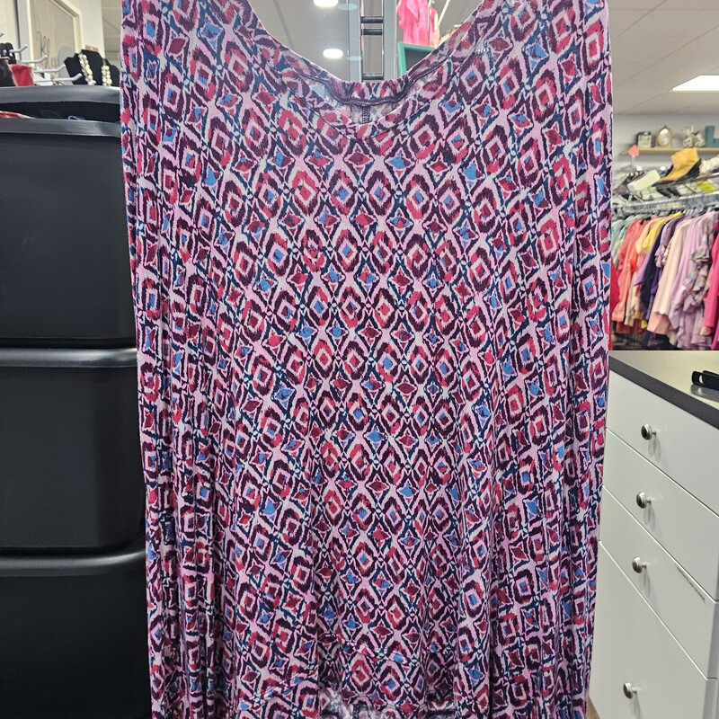 Short sleeve tunic style tee in pink with fun pattern. Perfect with leggings.