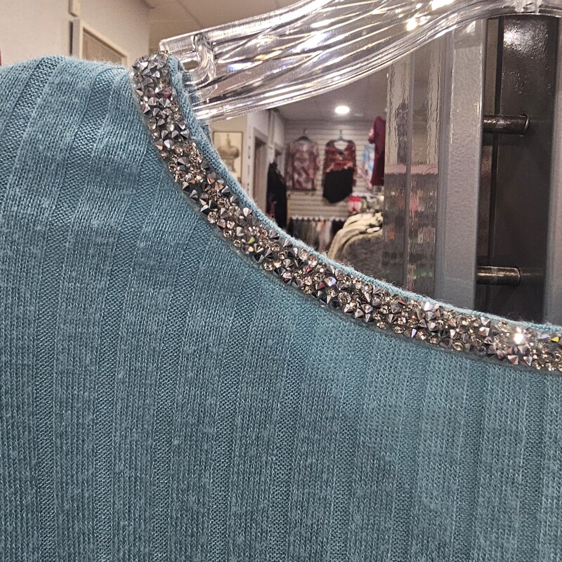 Long sleeve super soft and light weight blue sweater with blinged out neckline.
