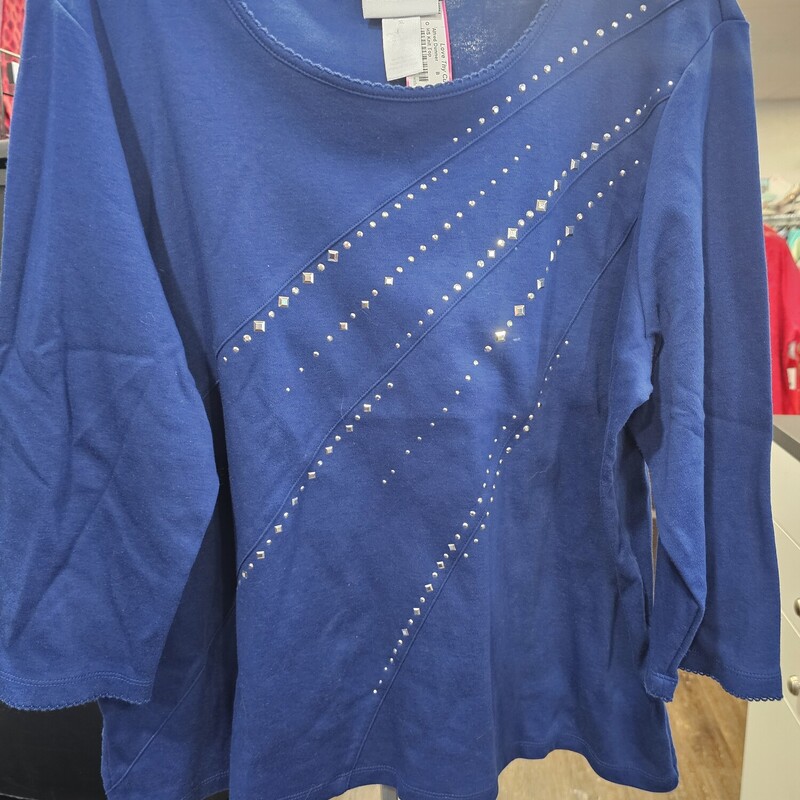 Half sleeve knit top in blue with silver studding design.