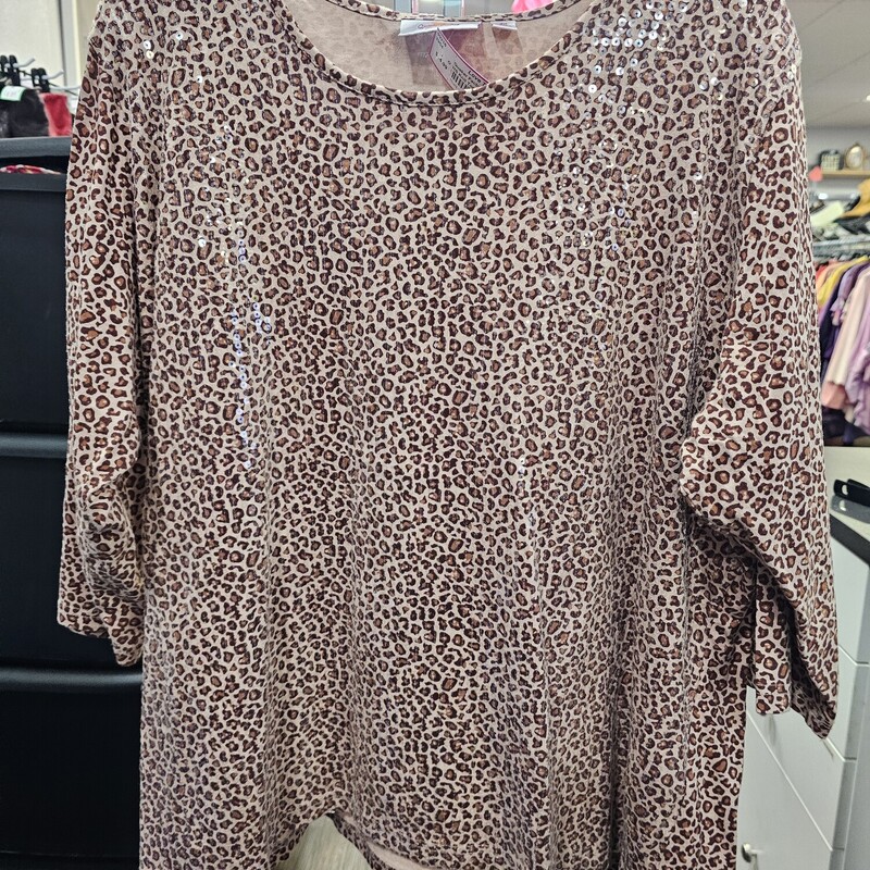 Half sleeve knit top in brown animal print and covered in clear sequins for sparkle.
