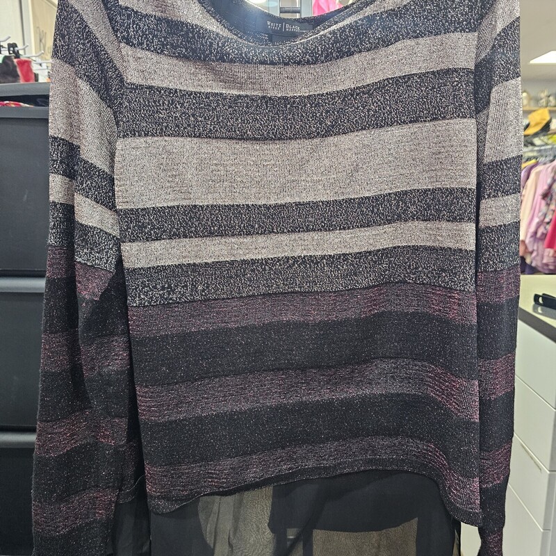 Year round wearability with this light weight dressy sweater in gold black and burgandy.