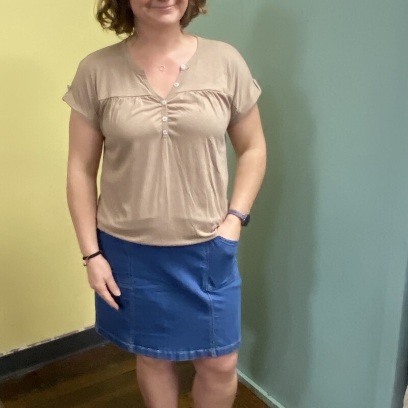 just a simple neutral top paired with a cute denim skirt