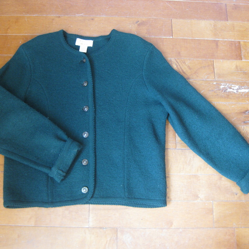 Vtg Tally Ho Boiled Wool, Green, Size: Medium<br />
Nice warm cardigan by Tally Ho.<br />
It's made of boiled wool with knit braid trim<br />
Round silver and black embossed metal buttons<br />
Made in Hong Kong<br />
Excellent condition<br />
Marked Size M, should fit a size large as well<br />
Here are the flat measurements, please double where appropriate:<br />
shoulder to shoulder: 18.5<br />
Armpit to armpit: 22.5<br />
width at hem when buttoned: 19<br />
underarm sleeve seam: 19<br />
Overall length: 23<br />
<br />
Thanks for looking!<br />
#66449
