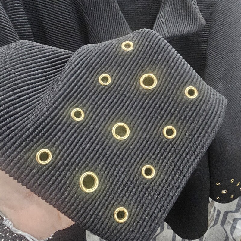 Brand new with tags, this no close blazer is lighter weight and half sleeve in black with gold rivets