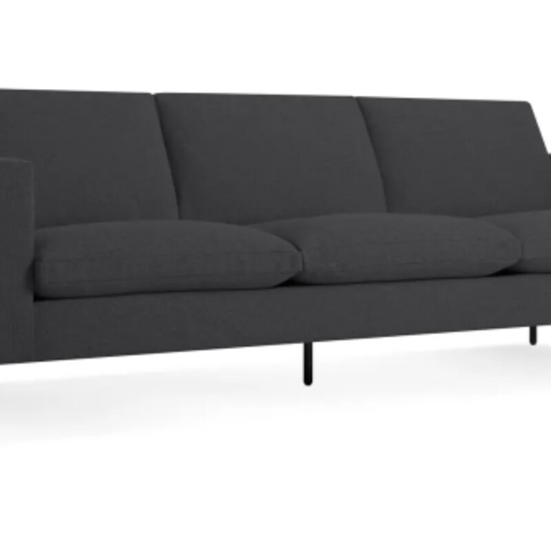 Blu Dot Standard Sofa<br />
Dark Grey Upholstery<br />
Size: 92 x 35 x 32H<br />
Kiln-dried wood frame<br />
Sinuous steel springs provide durable support beneath cushions<br />
High resiliency foam cushions with feather down wrap provide a mix of firm support and comfort, and with use will take on a more casual appearance. To promote even wear over time, we recommend fluffing and flipping cushions frequently after use<br />
Powder-coated steel legs<br />
Fifth support leg at center<br />
Fabric upholstery are made in the USA<br />
NEW Retail $2700