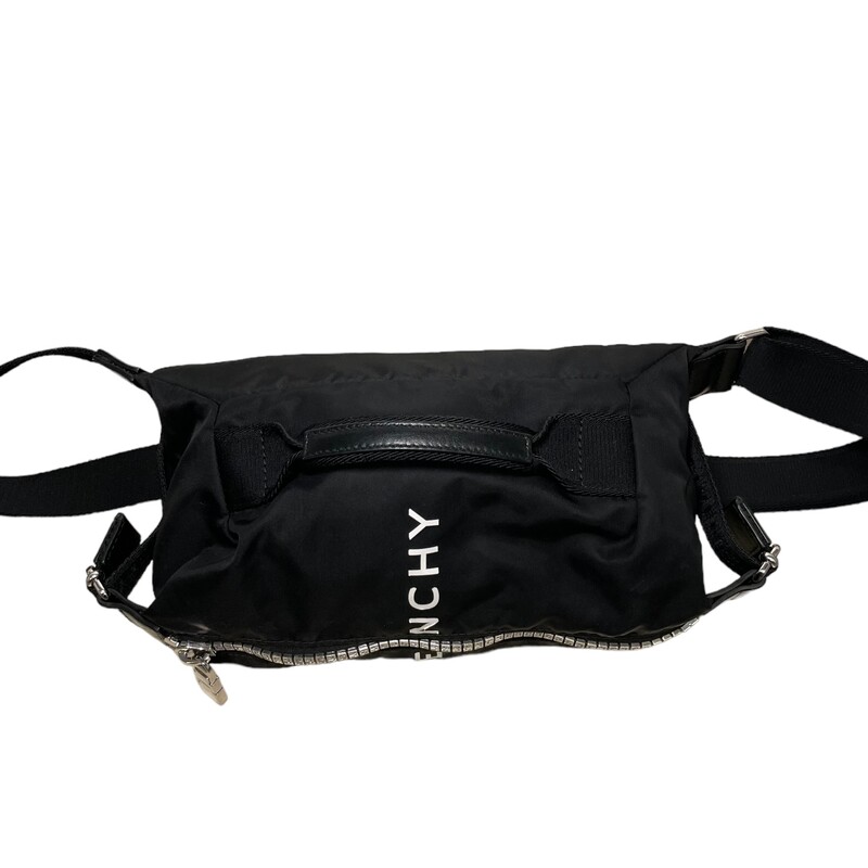 Givenchy G-Zip Bum Bag Black<br />
<br />
Dimensions:<br />
5.12 in x 11.81 in x 5.12 in<br />
<br />
Crossbody bag in nylon with decorative 4G zipper closing with GIVENCHY 4G zipper puller.<br />
G Zip line.<br />
Contrasting GIVENCHY signature printed on the front.<br />
One handle on the side.<br />
Adjustable strap with calfskin details and metal buckles on the sides to adjust the volume of the bag.<br />
Silvery-finish metal details.<br />
One main zipped compartment.