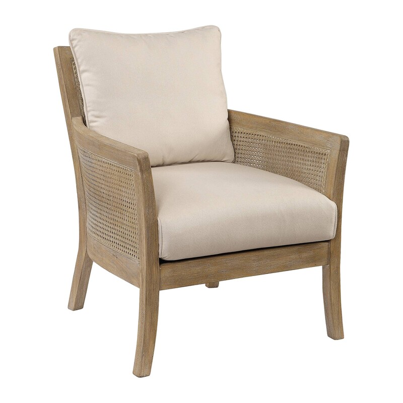 Uttermost Encore Rattan Armchair<br />
Cream Ulphostery Tan Rattan Wood Frame<br />
Size: 29x30x33H<br />
High supportive back and curvy flair arms make a grand style statement in a warm, washed and hand rubbed sandstone exposed hardwood finish with cane sides and tailored<br />
NEW Retail $1200