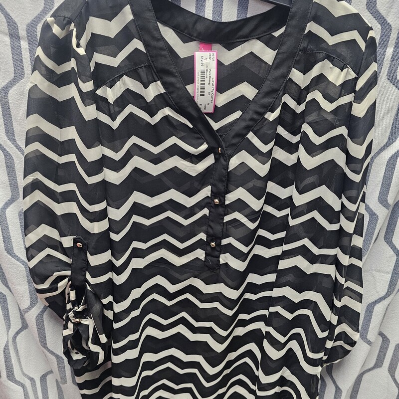 Sheer long to half sleeve blouse in black with off white chevron pattern.