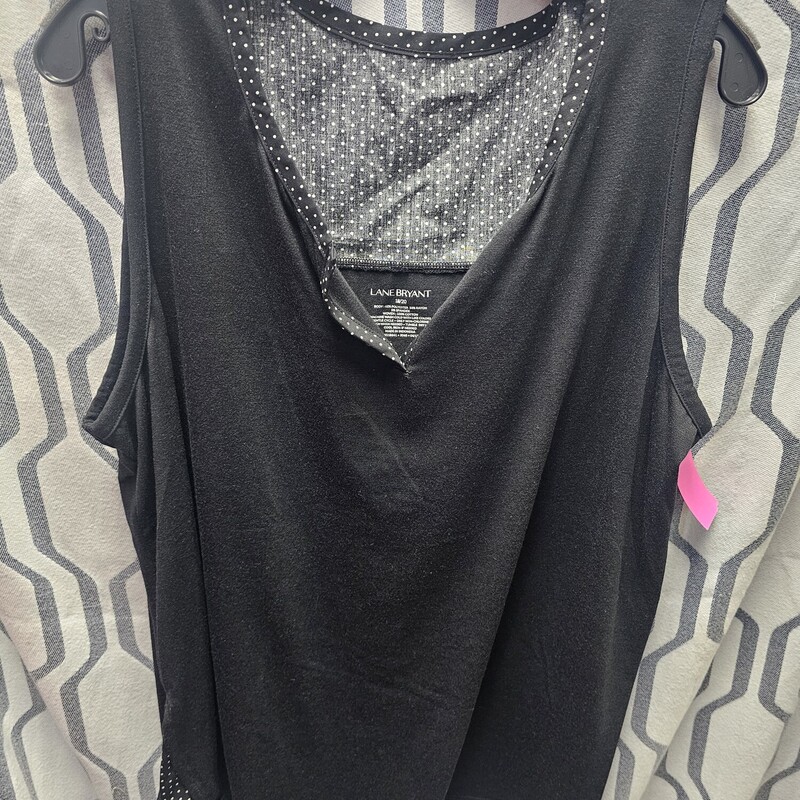 Sleeveless knit top in black .