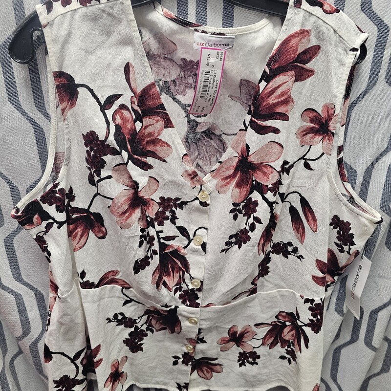 Brand new with tags and retails for $49, this sleeveless linen blouse is white with pink and burgandy floral print and button up front.
