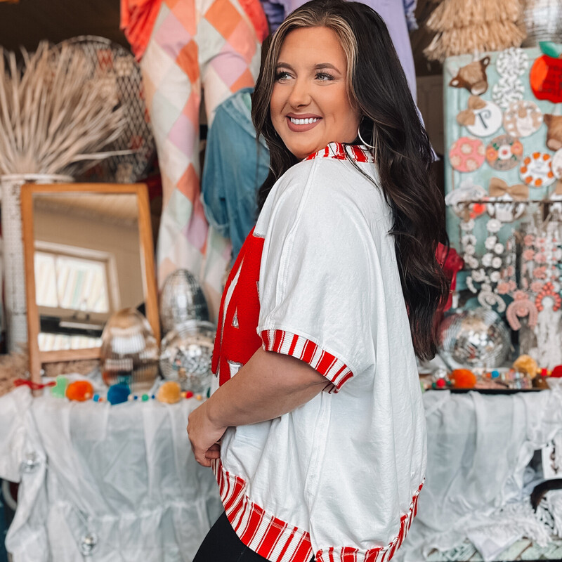 The perfect top for the summer season! Wear it for Independence Day or just because!<br />
Available in sizes Small, Medium, Large. These do run oversized.<br />
Madison is wearing a Medium!