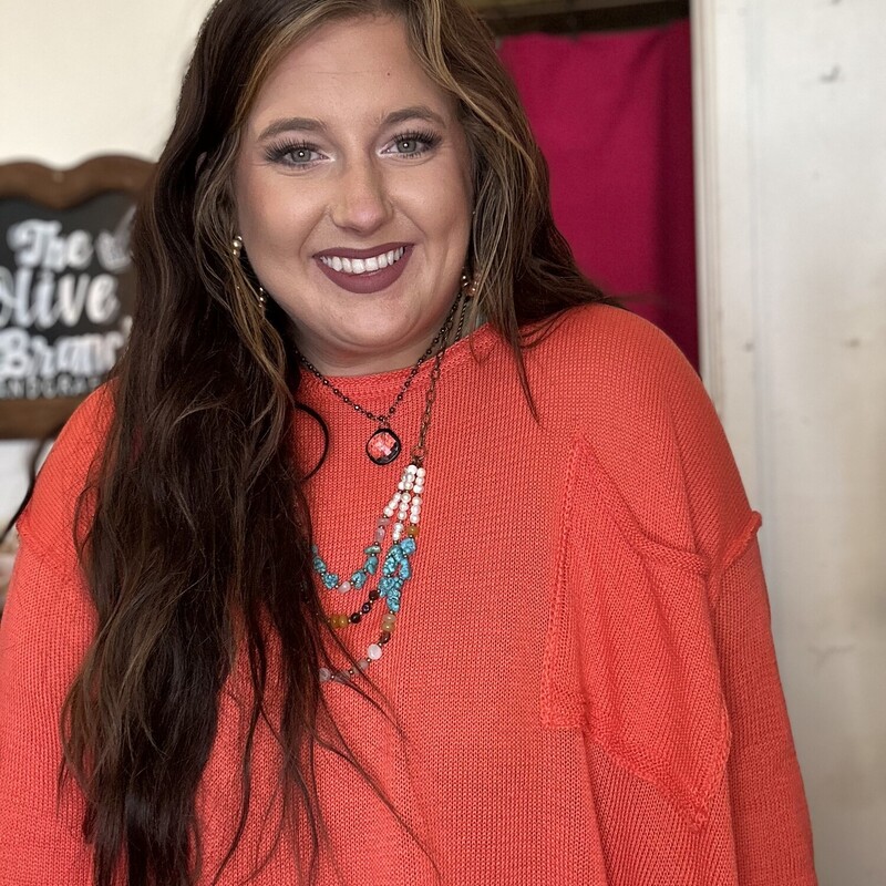 This oversized-lightweight sweater is perfect for  fall, or for layering in the winter!<br />
Available in Mustard and Coral, sizes Small, Medium, Large.<br />
Madison is wearing the Large.