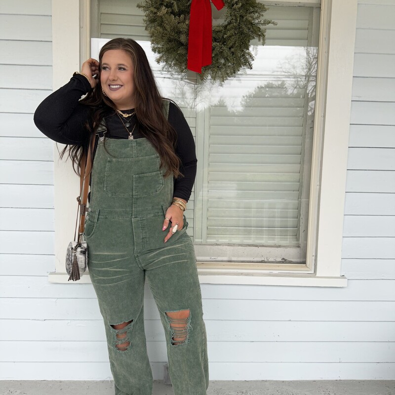 Pair these super fun distressed overalls with a longsleeve top and a hat! Perfect for chilly fall weather!<br />
Available in sizes Small, Medium, Large, and X-Large.<br />
Madison is wearing a size X-Large.
