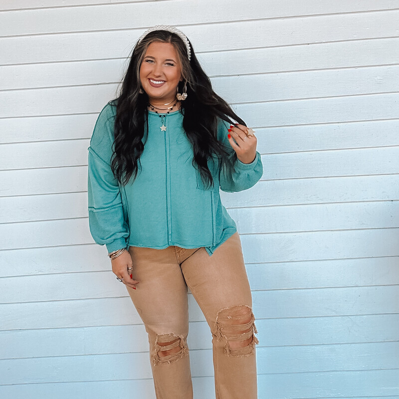 This lightweight-oversized sweater top is perfect for layering or for pairing with pants and cute booties!<br />
Madison is wearing a size Medium.