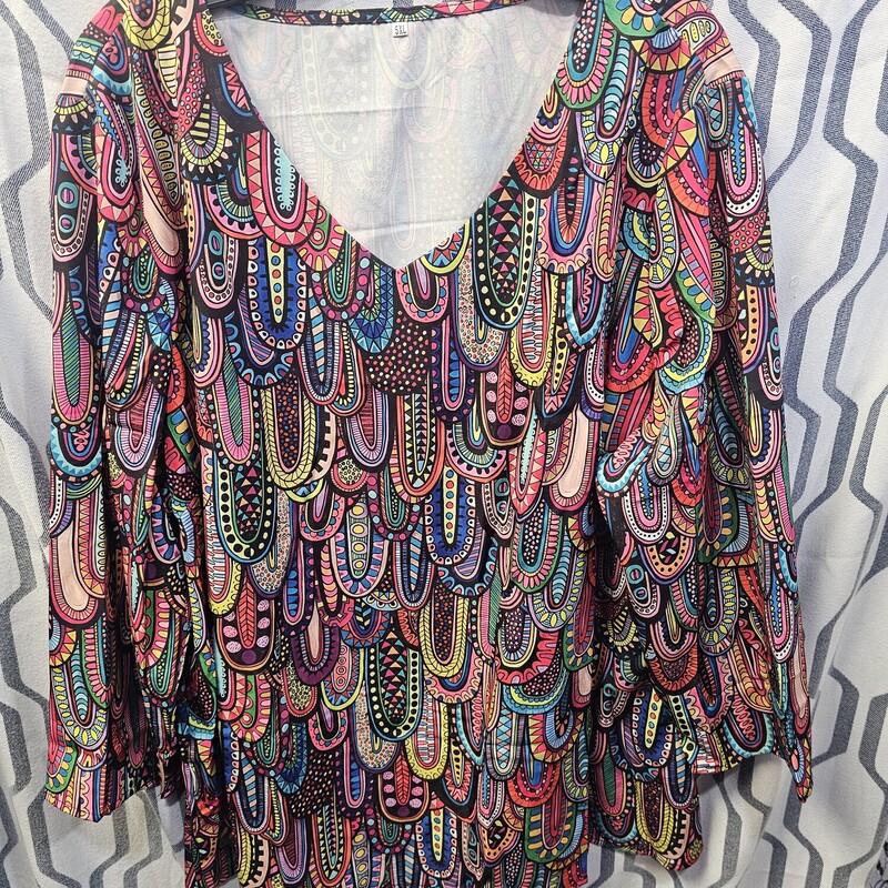 Half sleeve blouse in a fabulous mutli colored print. - May run a little small.