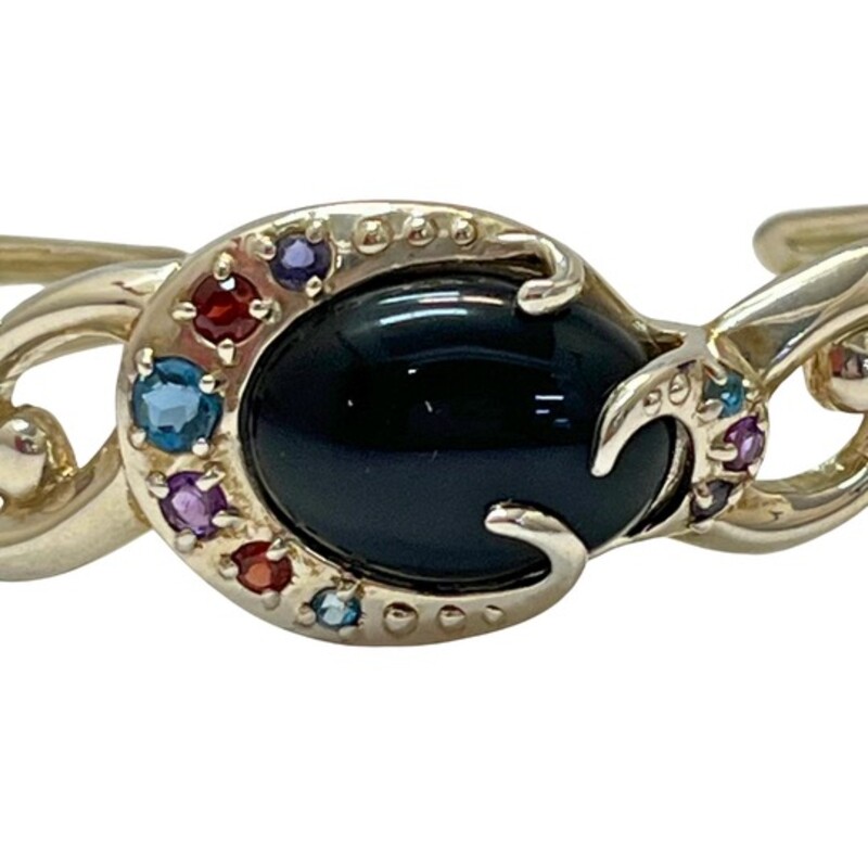 Vintage Carolyn Pollack ‘Moondance’ Sterling Silver
Cuff Bracelet
Limited-Edition Collection
A twisting frame of Sterling Silver entwines with the natural rainbow obsidian cabochon, embraced by a sparkling series of amethyst, blue topaz, garnet and iolite gemstones.