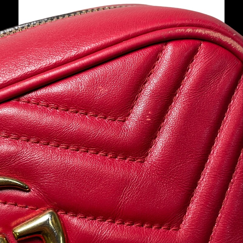 Gucci Marmont Camera Bag
Crafted from red matelassé leather, this small GG Marmont chain shoulder bag has a softly structured shape and a zip top closure with the Double G hardware. The chain shoulder strap has a leather shoulder detail.
Some scratches and corner wear
Some light discoloration on hardware
Dimensions: Small size: 9.5W x 5H x 3D