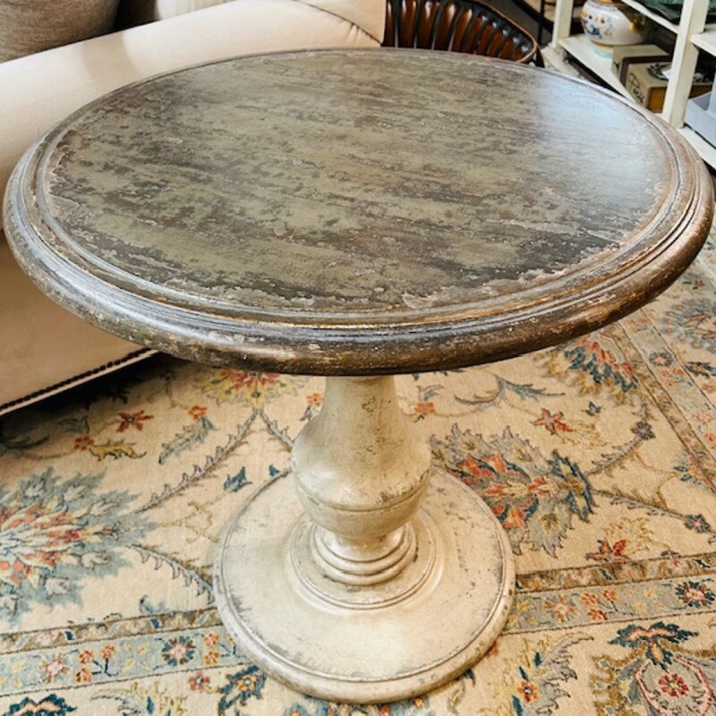 Arhaus Alessia Bell'Arte Distressed Wood End Table<br />
Brown Cream Gray Size: 28 x 26.5H<br />
Retails: $1299.00<br />
<br />
Like a work of fine art, our master artisans utilize centuries-old techniques passed down through generations to craft every detail of our exclusive Bell’Arte collection by hand. Made one at a time in a region of Italy renowned for its furniture-making, these exquisite pieces are built from solid poplar wood. Each hand-distressed surface is artfully finished, combining layers of stain, paint, and lacquer with careful brushstrokes—a process which takes over three days to complete per piece. Inspired by the countryside estates of Northern Italy and their beautiful stairwell banisters—featuring exaggerated shapes and complex, highly detailed finishes—our Alessia occasional tables are artfully adorned in reference to this elegant architecture.