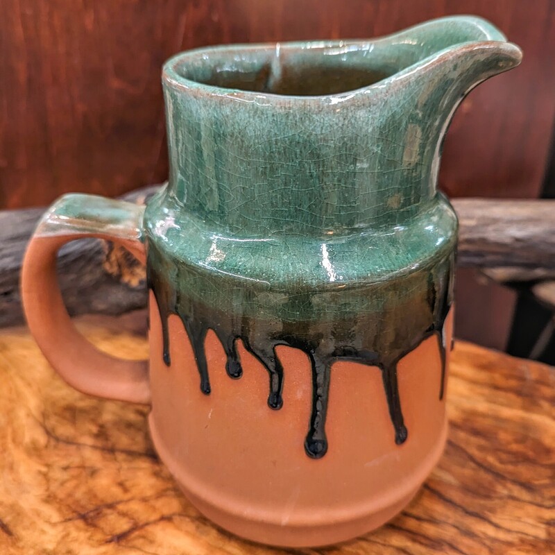 Drip Pottery Pitcher
Green Brown Size: 7 x 7H
Matching cups and mugs sold separately