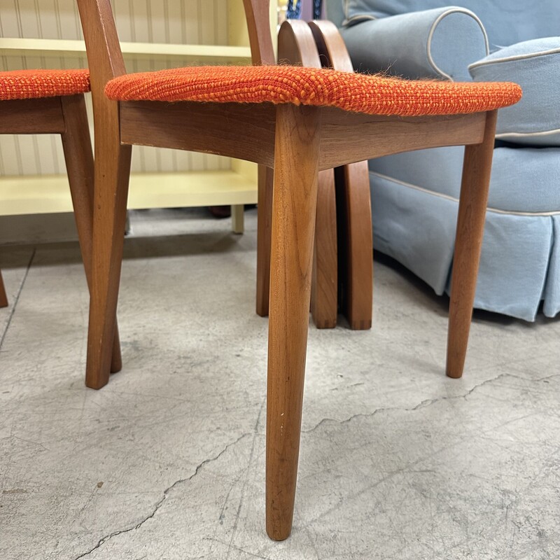 Being sold as a set of 2, these two Niels Koefoed mid-century chairs were made in Denmark. They are signed, and the finish is in beautiful condition. The orange seats need reupholstery.