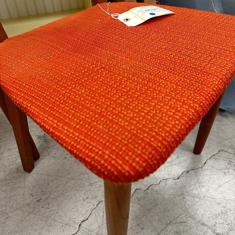 Being sold as a set of 2, these two Niels Koefoed mid-century chairs were made in Denmark. They are signed, and the finish is in beautiful condition. The orange seats need reupholstery.