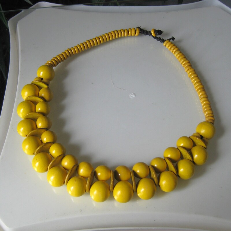 Cute wooden chocker length necklace and matching earrings in yellow<br />
the necklace closes with a loop and disk<br />
<br />
thanks for looking!<br />
#70027