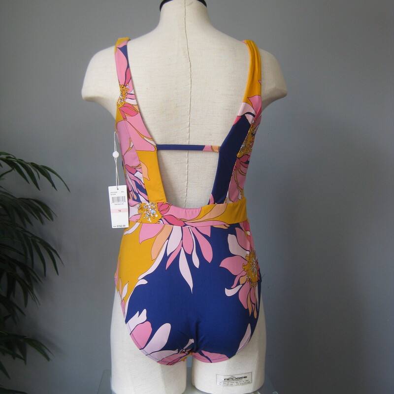 Gorgeous one piece swimsuit from Trina Turk<br />
Yellow and Purple splashy Pucci-esque print<br />
Plunging neckline<br />
size 10<br />
brand new never worn.<br />
<br />
thanks for looking!<br />
#69185