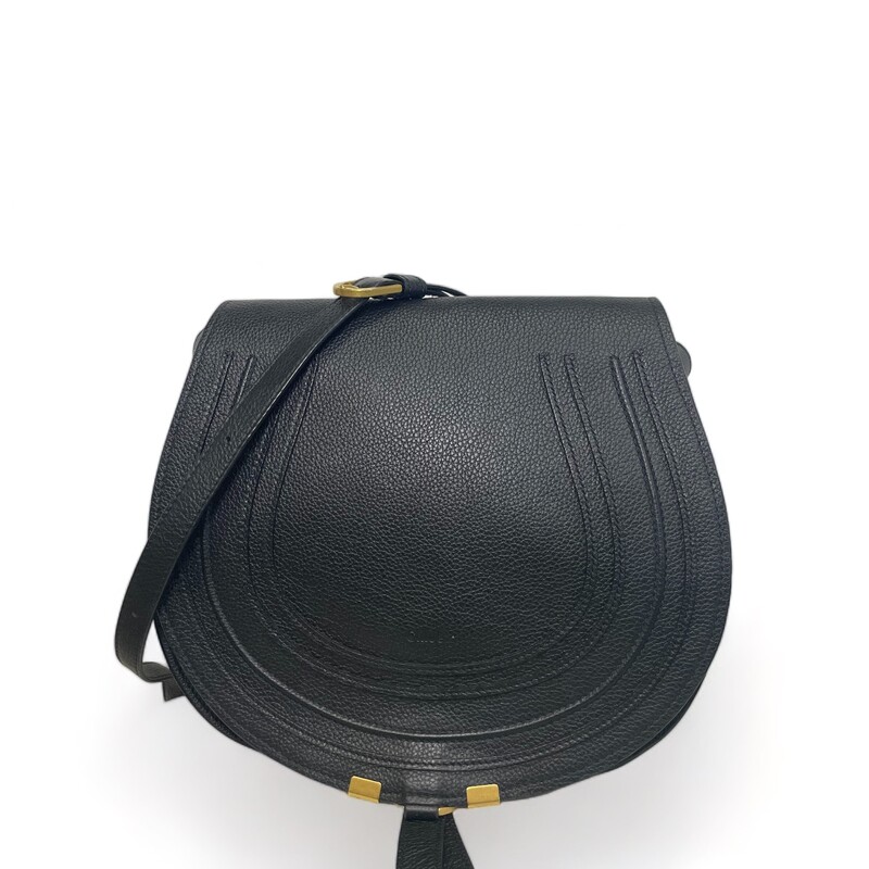 Black Chloe Marcie Crossbody
Marcie Medium Leather Saddle Bag in black leather and gold-tone hardware with dangling tassel
Fold Over Flap
Interior design details: flat card pocket
Dimensions: 13in wide x 9in high x 2.4in deep
Adjustable shoulder strap drops 22in