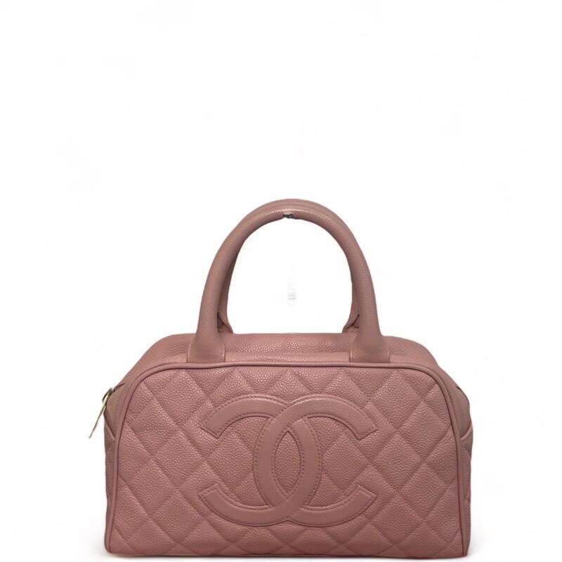 Chanel quilted pink caviar leather Bowling handbag, CC logo stitched to one side, slot pocket to the other, dual handles over zipper opening and tan lined interior with single zip pocket. Spacious interior to fit your daily essentials.
Year: 2003-2004
Dimensions:10Lengthx 6Height
Some minor pen marks inside