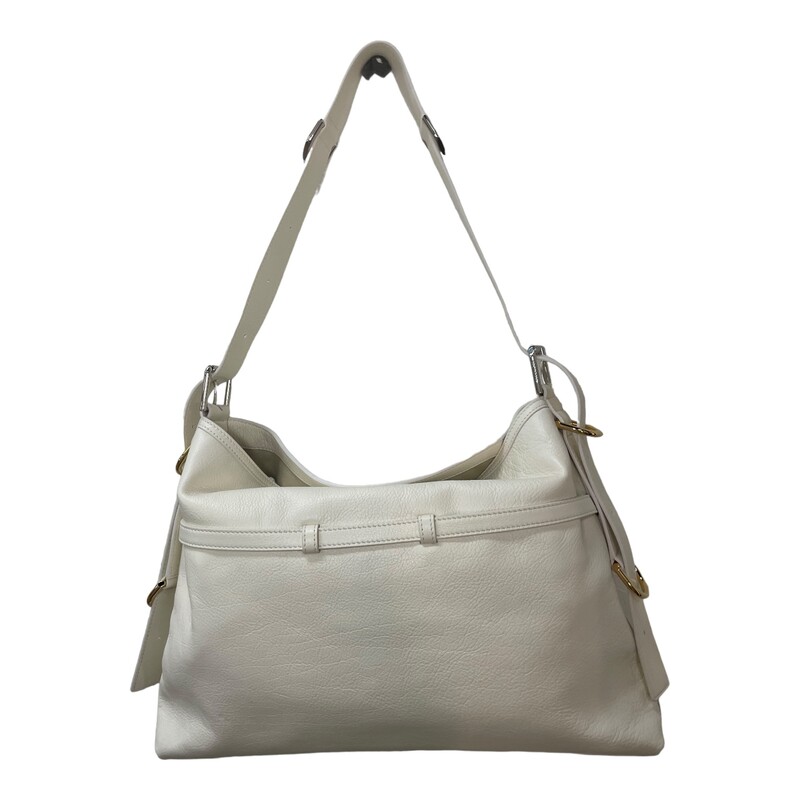 Givenchy Voyou Handbag White

Size: Medium

Dimensions:
15.75 in x 10.63 in x 2.56 in
Adjustable shoulder strap length from 11.4 to 39.8 in.
Minimal drop : 6.3 in and maximal drop : 21.2 in.

Medium shoulder bag in tumbled calfskin leather.
Voyou line.
V-shaped slouchy silhouette.
Adjustable shoulder strap offering hand, shoulder or crossbody carrying.
GIVENCHY engraved metal buckles.
Golden and silvery-finish metal details.
GIVENCHY signature embossed on the front of the bag and on the top of the shoulder strap.
One main compartment and one inside zipped pocket.