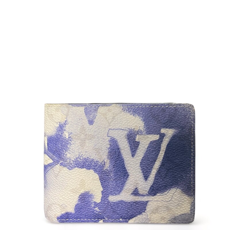 Louis Vuitton Watercolor Bifold

Color: Blue

Dimensions:
Length: 4.75 in
Width: 0.75 in
Height: 3.50 in

This is an authentic LOUIS VUITTON Monogram Watercolor Multiple Wallet. This stylish compact mens wallet is finely crafted of classic Louis Vuitton monogram on toile canvas in blue. The wallet opens to a blue cross grain leather interior with card slots, patch pockets, billfold slots.