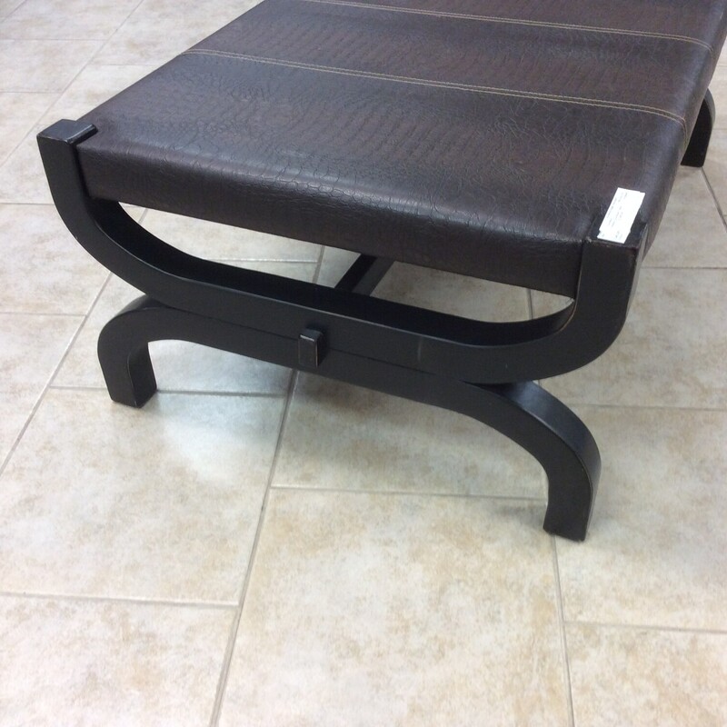 Ashley Cocktail Table with cushioned leather top and a black wood frame,  Size: 50x32x19