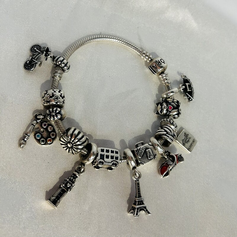 Pandora Bracelet  with 13 Charms
Silver Red Size: 7.5L