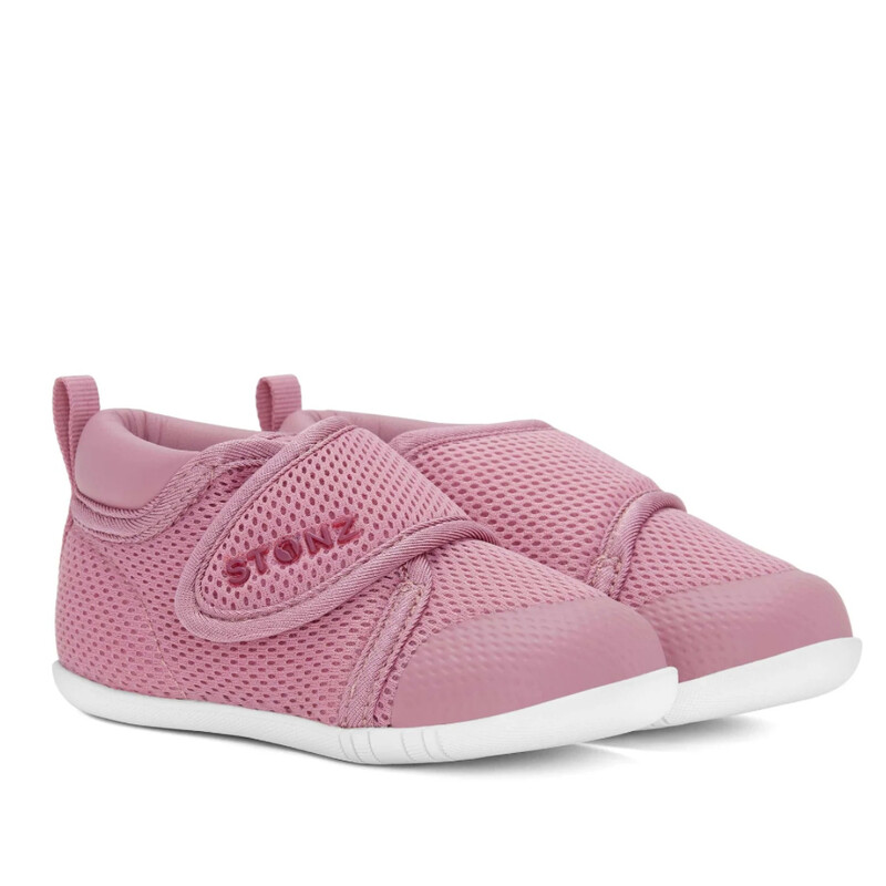 STONZ Cruiser Baby, Dusty Rose, Size: 24M

Designed for walking: Lightweight and flexible sole bends at the 1/3 front of the foot to help with balance and foot movement, while the reinforced heel keeps your little one stable (so less boo-boos from falling!)Fits narrow and chunky feet: The wide opening and Velcro closure will make it so easy to take your little one out in no time, once you slide these on and adjust, they’ll fit your baby perfectly (and stay on all day).Safe for early walkers: With a wide toe cap and a foot wrapping design, the Cruiser keeps their little toe beans protected from bumping around as they learn to walk.No stinky feet over here!: The breathable mesh upper and hi-poly insole keep their feet dry and breathing even after a hot day in the park.Safe for your child + the planet: Made from all-vegan and non-toxic materials, the cruiser keeps your child and the planet safe.

Easy on, for all chunky feet

The Cruiser opens wide, so it's easy to slip it on all chunky feet. With a soft velcro closure, it secures their little feet inside comfortably as they walk with confidence.

DESCRIPTION
Flexible, adjustable & breathable shoes for infants!
Help your baby walk with confidence! The Cruiser™ - Baby Shoe is based on scientific research and designed to support early walking. With sturdy ankle support and a flexible sole, this shoe will help your little one stand up and improve their balance.

Comfortable for them and easy for you, the wide opening of the Cruiser™ - Baby ensures you can slip them on and be out the door without the hassle; perfect for those hectic mornings. With a little practice, they’ll be walking, running and jumping in no time!