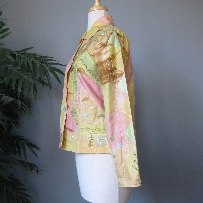 Here is a beautifully made wearable art jacket from Parlsey & Sage.<br />
It's made of lustrous pieced silk fabrics in yellow, green, tan and pink.<br />
Finished with delicate shell buttons.<br />
Long sleeves<br />
fully lined.<br />
marked size small<br />
Flat Measurements:<br />
Armpit to Armpit: 19.75<br />
width at hem: 20<br />
Length: 22.25<br />
Shoulder to shoulder: 16<br />
underarm sleeve seam: 18<br />
<br />
Thanks for looking!<br />
#2398