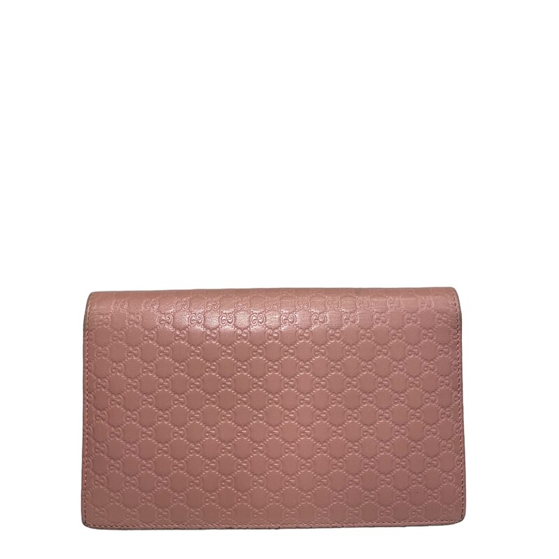 Gucci GG Pink Clutch<br />
This crossbody bag features a leather body, a detachable flat strap, a flap with a magnetic button closure, an interior zip compartment and interior slip pockets.<br />
Style Code:466507-0416<br />
*missing long stap<br />
Dimensions: 7.25L x 4H x 0.75D