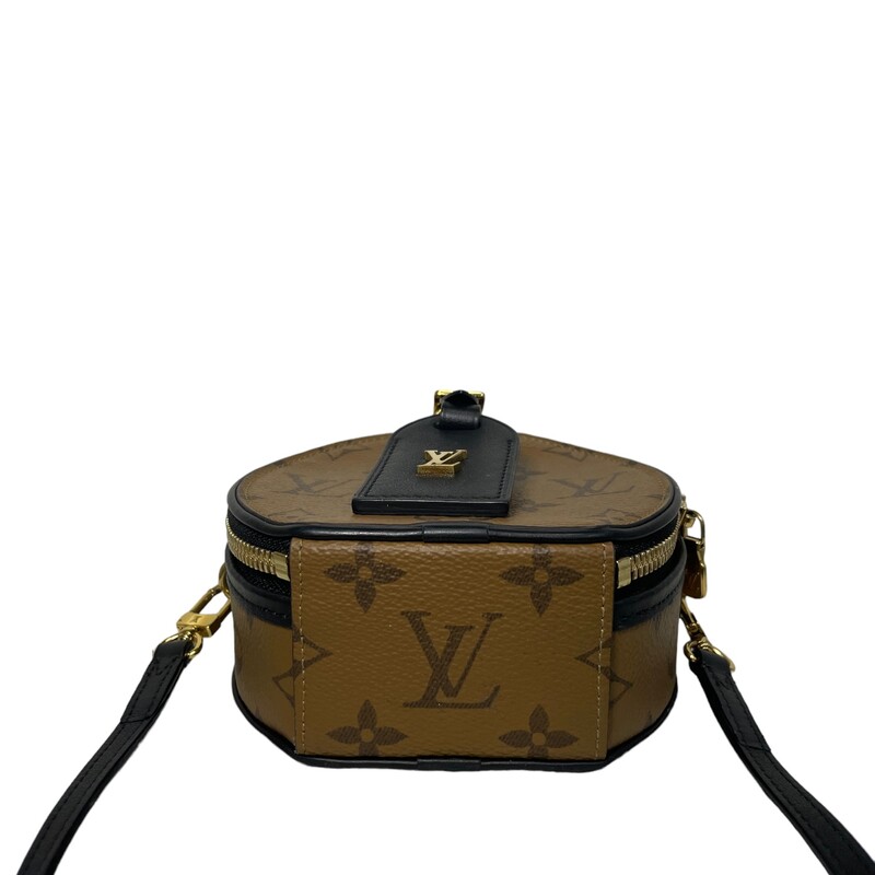 Louis Vuitton Mini Boite Handbag
From the 2019 Collection by Nicolas Ghesquière
Brown Coated Canvas
Printed
Gold-Tone Hardware
Leather Trim
Flat Handle & Single Adjustable Shoulder Strap
Leather Trim Embellishment
Leather Lining & Single Interior Pocket
Zip Closure at Top
Includes Luggage Tag
Dimensions:Shoulder Strap Drop: 21.25
Handle Drop: 1
Height: 4.5
Width: 4.75
Depth: 2.25
