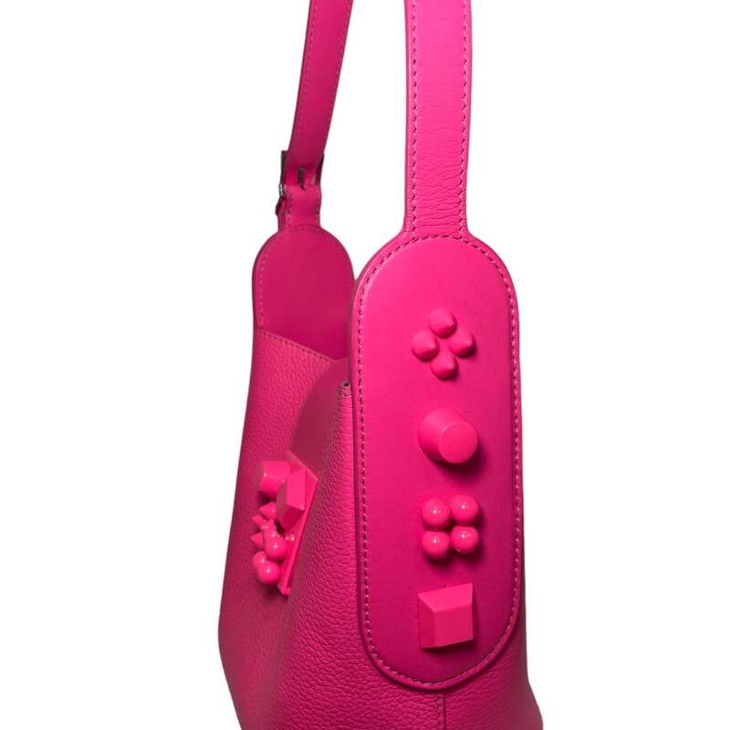 Louboutin Pink Bucket,<br />
Inspired by Christian Louboutin's passion for jewels and crowns, this calfskin-leather bucket bag possesses sleek lines and timeless elegance.<br />
Dimensions: W x 6 1/2H x 4 1/2D.