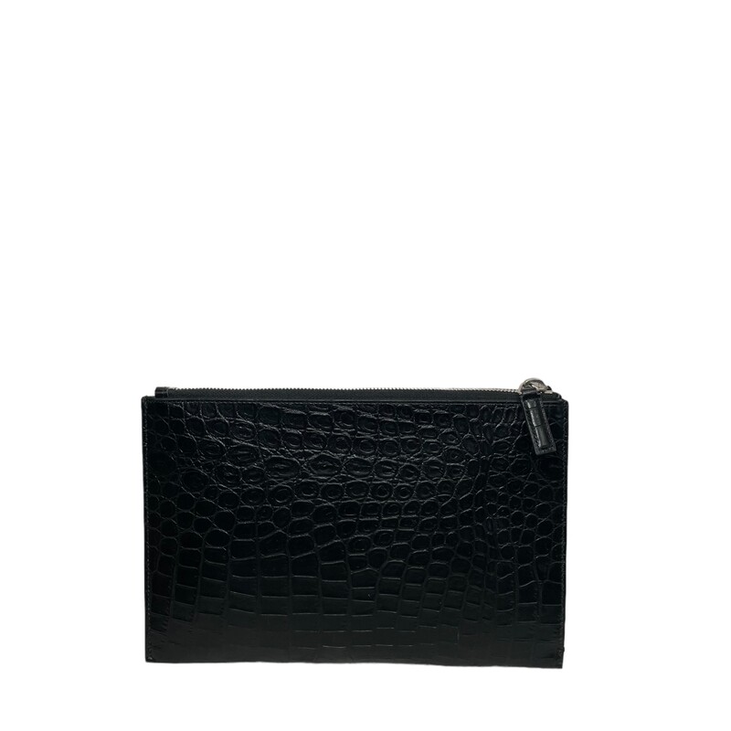YSL Crocdile Clutch<br />
Saint Laurent Portfolio<br />
From the 2017 Collection<br />
Black Leather<br />
Silver-Tone Hardware<br />
Twill Lining & Dual Interior Pockets<br />
Zip Closure at Top<br />
Includes Dust Bag<br />
<br />
Dimensions:<br />
Height: 6.5<br />
Width: 10<br />
Depth: 0.25<br />
Code: 478486